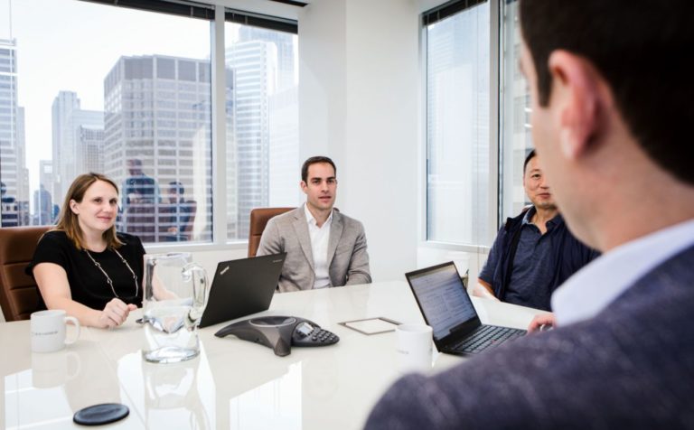 New Harbor Capital's team meeting about lower middle-market private equity investment opportunities