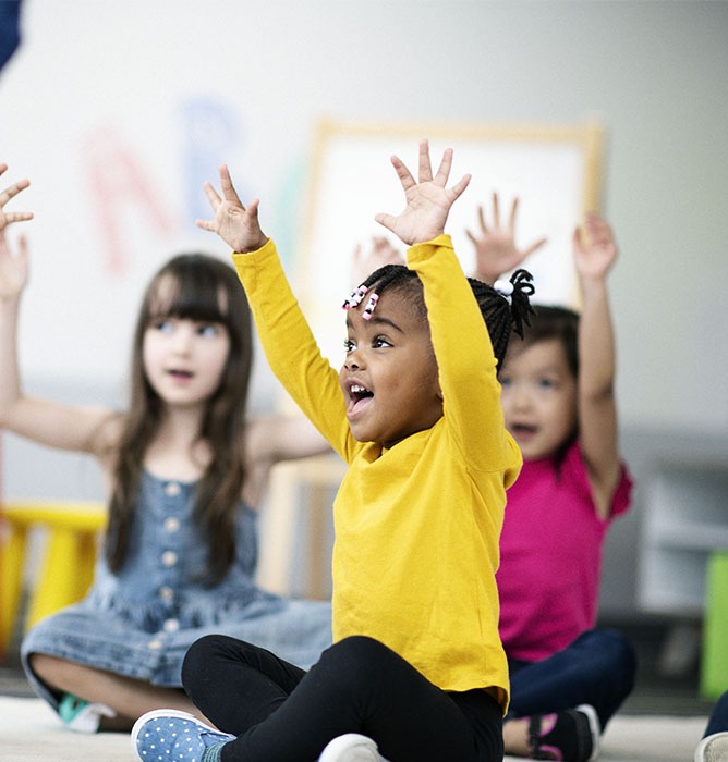 Early childhood students learning at New York Kids Club