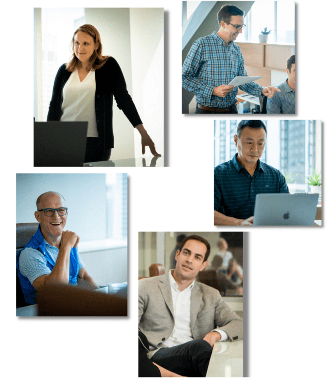 New Harbor Capital investment team members collaborate on private equity deal