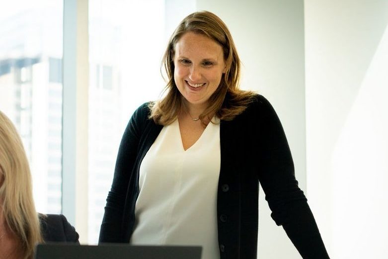 New Harbor Capital Partner Jocelyn Stanley collaborates with investment team on private equity deal